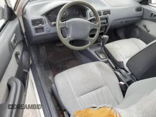 1996 Toyota Tercel DX z VIN JT2AC52L5T0158041, wystawiony jako Copart lot #80121114 z przebiegiem 35 691 mil mil oraz Szkoda całkowita • Salvage title. Historia ofert i sprzedaży dostępna na DreamBid. Obrazek 8.