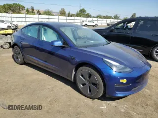 2022 Tesla Model 3 with VIN 5YJ3E1EA0NF361050, listed as a Copart auction lot 62446144 with 38,808 mi miles and Salvage Title. Bid and sale history available at carsss.com. Image 4.