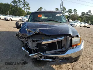 2000 Ford Excursion Limited with VIN 1FMNU42F5YEA90629, listed as a Copart auction lot 58949025 with 449,482 mi miles and Salvage title. Bid and sale history available at DreamBid. Image 5.
