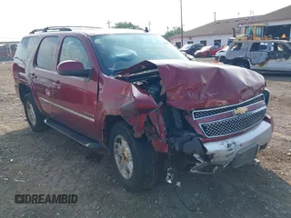 2011 Chevrolet Tahoe LT with VIN 1GNSKBE02BR310230, listed as a IAAI auction lot 42703227 with 175,986 mi miles and . Bid and sale history available at DreamBid. Image 1.