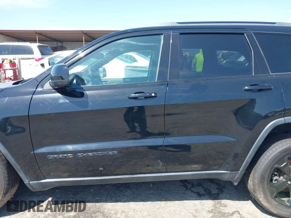 2019 Jeep Grand Cherokee Altitude with VIN 1C4RJFAG8KC808309, listed as a IAAI auction lot 41977457 with 122,923 mi miles and . Bid and sale history available at DreamBid. Image 14.