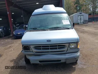 1999 Ford Econoline Passenger XL z VIN 1FMRE112XXHA78677, wystawiony jako IAAI lot #41973782 z przebiegiem 142 051 mil mil oraz . Historia ofert i sprzedaży dostępna na DreamBid. Obrazek 12.