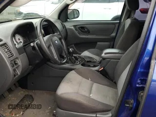 2005 Ford Escape XLS Value с VIN 1FMYU02Z35KA37621, выставлен на аукционе Copart как лот 44817004 с пробегом Не указан миль и Списание • Salvage title. История ставок и продаж доступна на DreamBid. Изображение 7.