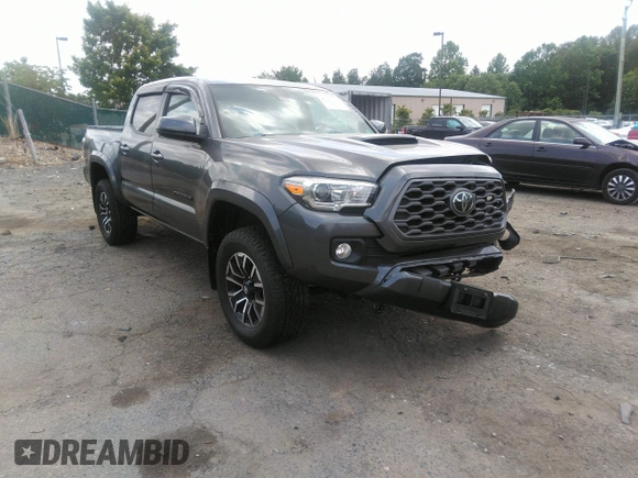 2021 Toyota Tacoma SR z VIN 3TYCZ5AN7MT017377, wystawiony jako IAAI lot #42285326 z przebiegiem 91 657 mil mil oraz . Historia ofert i sprzedaży dostępna na DreamBid. Obrazek 1.