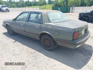 1989 Oldsmobile Cutlass Ciera with VIN 2G3AJ51NXK2439345, listed as a IAAI auction lot 42128301 with 241,434 mi miles and . Bid and sale history available at DreamBid. Image 3.
