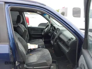 2003 Honda CR-V EX with VIN JHLRD78853C001990, listed as a IAAI auction lot 42151771 with 306,724 mi miles and . Bid and sale history available at carsss.com. Image 5.