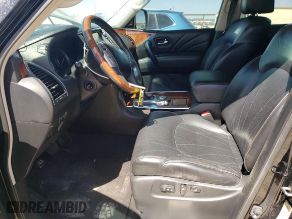 2015 Infiniti QX80 z VIN JN8AZ2NDXF9770443, wystawiony jako Copart lot #49982175 z przebiegiem 255 778 mil mil oraz Czysty tytuł • Clean title. Historia ofert i sprzedaży dostępna na DreamBid. Obrazek 7.