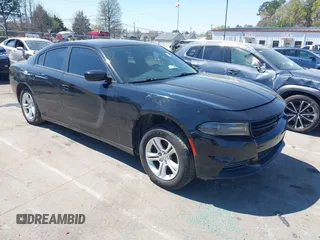 2019 Dodge Charger SXT with VIN 2C3CDXBG5KH713354, listed as a IAAI auction lot 41880772 with 133,408 mi miles. Bid and sale history available at carsss.com. Image 1.