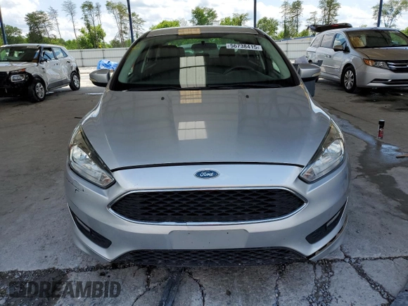 2016 Ford Focus SE z VIN 1FADP3F29GL268308, wystawiony jako Copart lot #56738415 z przebiegiem 111 702 mil mil oraz Szkoda całkowita • Salvage title. Historia ofert i sprzedaży dostępna na DreamBid. Obrazek 5.