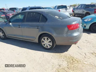 2013 Volkswagen Jetta S with VIN 3VW2K7AJ0DM217194, listed as a IAAI auction lot 42057811 with 125,572 mi miles and . Bid and sale history available at DreamBid. Image 3.
