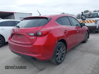 2018 Mazda 3 Touring with VIN 3MZBN1L37JM167604, listed as a IAAI auction lot 41623232 with 118,974 mi miles. Bid and sale history available at carsss.com. Image 4.