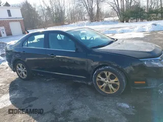 2012 Ford Fusion SE z VIN 3FAHP0HA1CR120251, wystawiony jako IAAI lot #41411959 z przebiegiem 180 009 mil mil oraz . Historia ofert i sprzedaży dostępna na DreamBid. Obrazek 13.