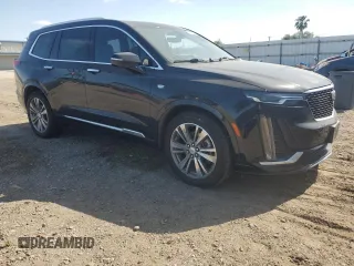 2021 Cadillac XT6 Premium Luxury with VIN 1GYKPCRS4MZ199110, listed as a Copart auction lot 51798905 with 66,486 mi miles and Salvage Title. Bid and sale history available at DreamBid. Image 4.