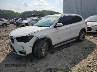 2017 BMW X1 xDrive28i with VIN WBXHT3C35H5F86099, listed as a Copart auction lot 60196275 with 61,117 mi miles and Salvage title. Bid and sale history available at DreamBid. Image 1.