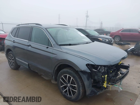 2021 Volkswagen Tiguan SE with VIN 3VV2B7AX8MM143189, listed as a IAAI auction lot 41646843 with 56,672 mi miles and . Bid and sale history available at DreamBid. Image 1.