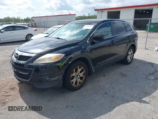 2012 Mazda CX-9 Touring with VIN JM3TB2CA7C0351670, listed as a IAAI auction lot 42148313 with 248,799 mi miles and . Bid and sale history available at DreamBid. Image 2.