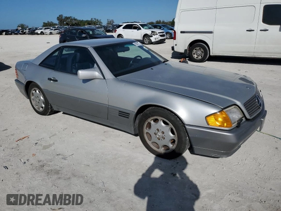 1991 MERCEDES-BENZ SL-CLASS SL with VIN WDBFA61E1MF022918, listed as a Copart auction lot 85011784 with 262,144 mi miles and Salvage Title. Bid and sale history available at DreamBid. Image 4.