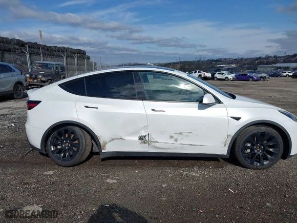 2023 Tesla Model Y Long Range with VIN 7SAYGDEE2PA059668, listed as a IAAI auction lot 41901079 with 58,276 mi miles. Bid and sale history available at carsss.com. Image 6.