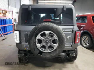 2023 Ford Bronco z VIN 1FMDE5AH9PLB83620, wystawiony jako Copart lot #60644035 z przebiegiem 6 700 mil mil oraz Szkoda całkowita • Salvage title. Historia ofert i sprzedaży dostępna na DreamBid. Obrazek 6.