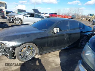 2019 BMW 5 Series 540i xDrive with VIN WBAJE7C54KWD55100, listed as a IAAI auction lot 41476251 with 74,733 mi miles and . Bid and sale history available at carsss.com. Image 14.