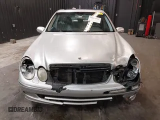 2003 Mercedes-Benz E 500 with VIN WDBUF70J03A101277, listed as a IAAI auction lot 40872555 with 330,553 mi miles and . Bid and sale history available at DreamBid. Image 13.