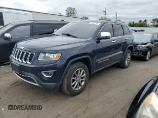 2014 Jeep Grand Cherokee Limited z VIN 1C4RJFBG6EC351101, wystawiony jako Copart lot #58202045 z przebiegiem 130 944 mil mil oraz Szkoda całkowita • Salvage title. Historia ofert i sprzedaży dostępna na DreamBid. Obrazek 1.