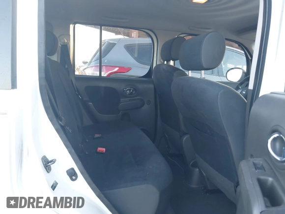 2009 Nissan Cube SL z VIN JN8AZ28R99T102860, wystawiony jako IAAI lot #42441475 z przebiegiem 151 466 mil mil oraz . Historia ofert i sprzedaży dostępna na DreamBid. Obrazek 8.