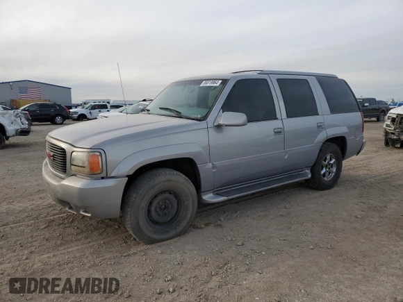 2000 GMC Denali z VIN 1GKEK63R9YR225073, wystawiony jako Copart lot #86819964 z przebiegiem 207 827 mil mil oraz Szkody całkowita. Historia ofert i sprzedaży dostępna na DreamBid. Obrazek 1.