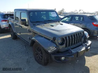 2023 Jeep Gladiator Freedom with VIN 1C6HJTAG9PL517097, listed as a IAAI auction lot 41860666 with 24,478 mi miles. Bid and sale history available at carsss.com. Image 1.