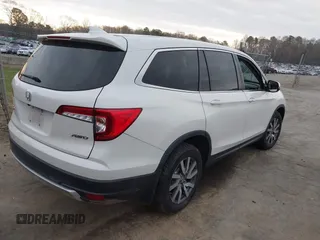 2019 Honda Pilot EX-L with VIN 5FNYF6H59KB075577, listed as a IAAI auction lot 41863841 with 102,242 mi miles and . Bid and sale history available at carsss.com. Image 4.