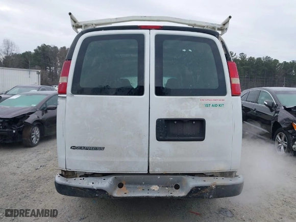 2005 Chevrolet Express Cargo Van with VIN 1GCGG25V351163463, listed as a IAAI auction lot 41407058 with 236,277 mi miles. Bid and sale history available at carsss.com. Image 16.