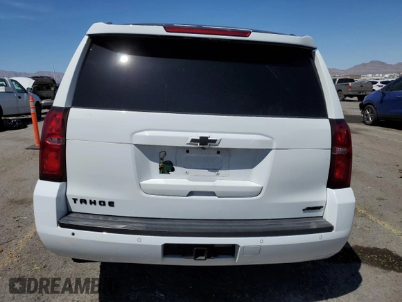 2018 Chevrolet Tahoe LS with VIN 1GNSCAKC0JR296669, listed as a Copart auction lot 54044745 with 147,457 mi miles and Salvage title. Bid and sale history available at DreamBid. Image 6.