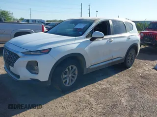 2019 Hyundai Santa Fe SE z VIN 5NMS23AD7KH058499, wystawiony jako IAAI lot #41963798 z przebiegiem Nie podano mil oraz . Historia ofert i sprzedaży dostępna na DreamBid. Obrazek 2.