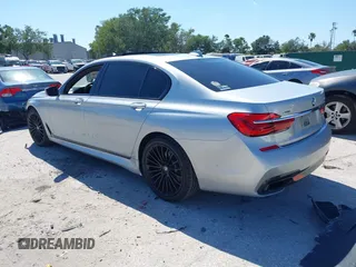 2016 BMW 7 Series 750i xDrive with VIN WBA7F2C52GG417733, listed as a IAAI auction lot 42040625 with 91,007 mi miles. Bid and sale history available at carsss.com. Image 3.