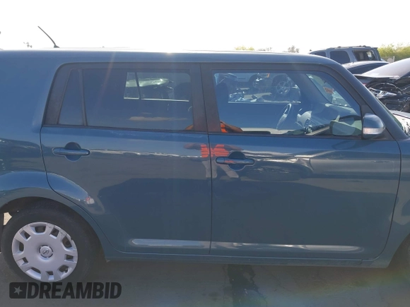 2009 Scion xB with VIN JTLKE50EX91094466, listed as a IAAI auction lot 42068298 with 236,237 mi miles. Bid and sale history available at carsss.com. Image 12.