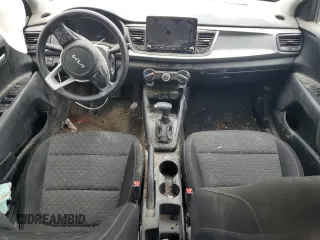 2022 Kia Rio LX with VIN 3KPA24AD7NE486506, listed as a Copart auction lot 64212244 with 52,852 mi miles and Salvage Title. Bid and sale history available at carsss.com. Image 8.