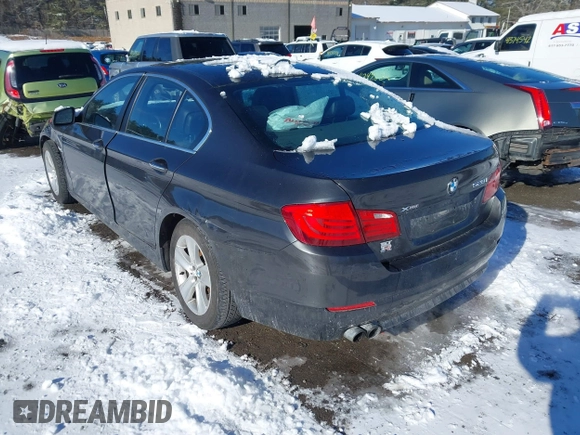 2013 BMW 5 Series 528i xDrive with VIN WBAXH5C55DDW12945, listed as a IAAI auction lot 41343124 with 137,672 mi miles and . Bid and sale history available at carsss.com. Image 3.