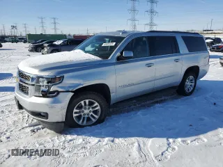 2019 Chevrolet Suburban LT with VIN 1GNSKHKC0KR380519, listed as a Copart auction lot 45405935 with 101,110 mi miles and Salvage Title. Bid and sale history available at DreamBid. Image 1.
