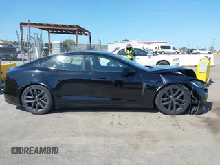 2022 Tesla Model S Plaid with VIN 5YJSA1E61NF483354, listed as a IAAI auction lot 41973636 with 32,541 mi miles and . Bid and sale history available at DreamBid. Image 13.