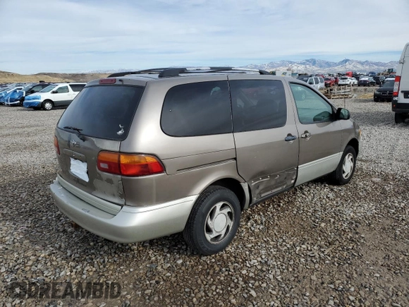 1999 Toyota Sienna LE with VIN 4T3ZF13C7XU133135, listed as a Copart auction lot 80618034 with 200,910 mi miles and Salvage Title. Bid and sale history available at carsss.com. Image 3.