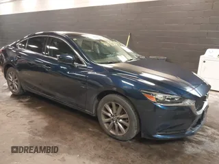 2018 Mazda Mazda6 Sport with VIN JM1GL1UMXJ1330989, listed as a IAAI auction lot 41355353 with 52,869 mi miles. Bid and sale history available at carsss.com. Image 1.