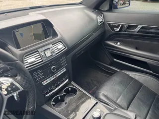 2017 Mercedes-Benz E-Class E 400 with VIN WDDKJ6HB8HF353602, listed as a IAAI auction lot 41963703 with 148,972 mi miles. Bid and sale history available at carsss.com. Image 6.