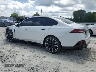 2024 BMW 5 Series 540i xDrive with VIN WBA63FJ04RCS00990, listed as a Copart auction lot 60112415 with Not provided miles and Salvage title. Bid and sale history available at DreamBid. Image 2.