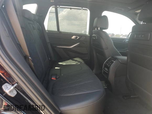 2023 BMW X5 M50i z VIN 5UXJU4C09P9P94657, wystawiony jako Copart lot #50709685 z przebiegiem Nie podano mil oraz Szkoda całkowita • Salvage title. Historia ofert i sprzedaży dostępna na DreamBid. Obrazek 11.