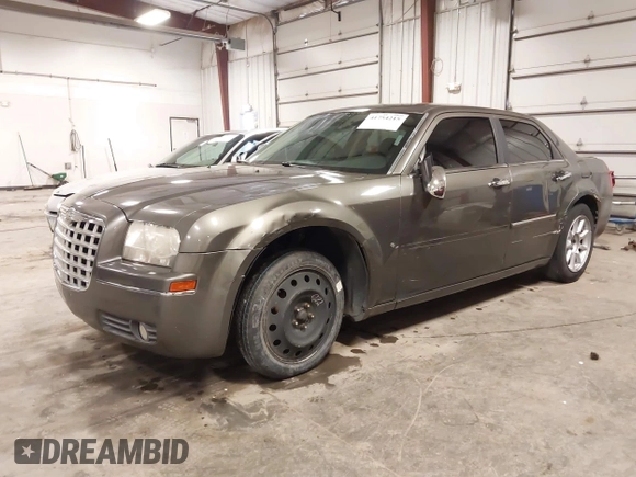 2010 Chrysler 300 Touring with VIN 2C3CA5CV9AH213299, listed as a IAAI auction lot 41754215 with 172,467 mi miles. Bid and sale history available at carsss.com. Image 23.