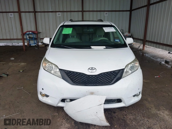 2014 Toyota Sienna XLE with VIN 5TDYK3DC6ES444121, listed as a IAAI auction lot 42110190 with 240,366 mi miles and . Bid and sale history available at DreamBid. Image 12.