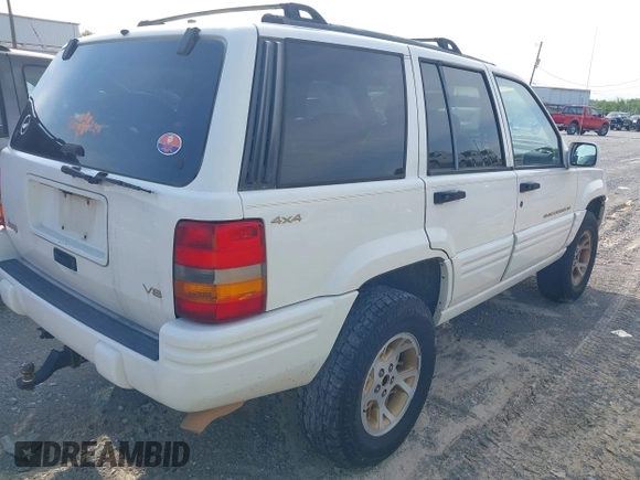 1998 Jeep Grand Cherokee Limited z VIN 1J4GZ78Y9WC342250, wystawiony jako IAAI lot #42047991 z przebiegiem 271 579 mil mil oraz . Historia ofert i sprzedaży dostępna na DreamBid. Obrazek 4.
