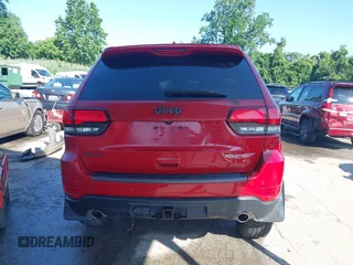 2021 Jeep Grand Cherokee Trailhawk with VIN 1C4RJFLG8MC549403, listed as a IAAI auction lot 42538177 with 33,124 mi miles and . Bid and sale history available at DreamBid. Image 16.