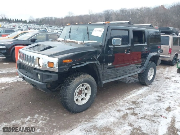 2003 Hummer H2 with VIN 5GRGN23UX3H106356, listed as a IAAI auction lot 41185603 with 1 mi miles. Bid and sale history available at carsss.com. Image 2.