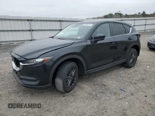 2021 Mazda CX-5 Touring with VIN JM3KFBCM7M1480336, listed as a Copart auction lot 48854415 with 51,774 mi miles and Salvage Title. Bid and sale history available at carsss.com. Image 1.